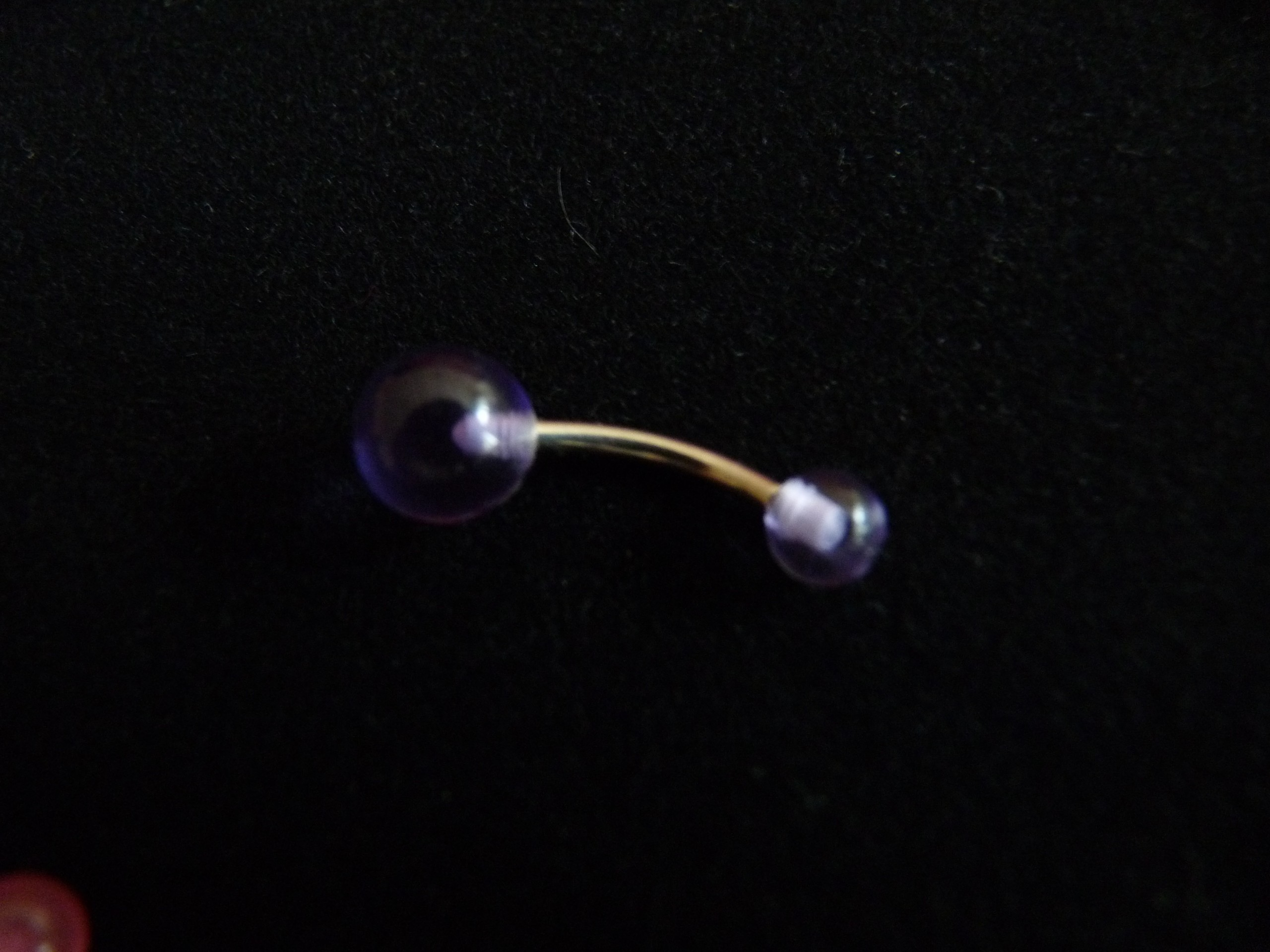 NOMBRIL Translucide mauve ( stock : 1 )